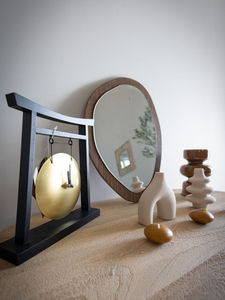 La décoration, tout en simplicité et en douceur, privilégie des matériaux naturels et des teintes harmonieuses, renforçant le sentiment de calme.