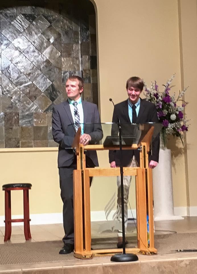 Chaplain Joshua Woods introducing Andrew before a sermon