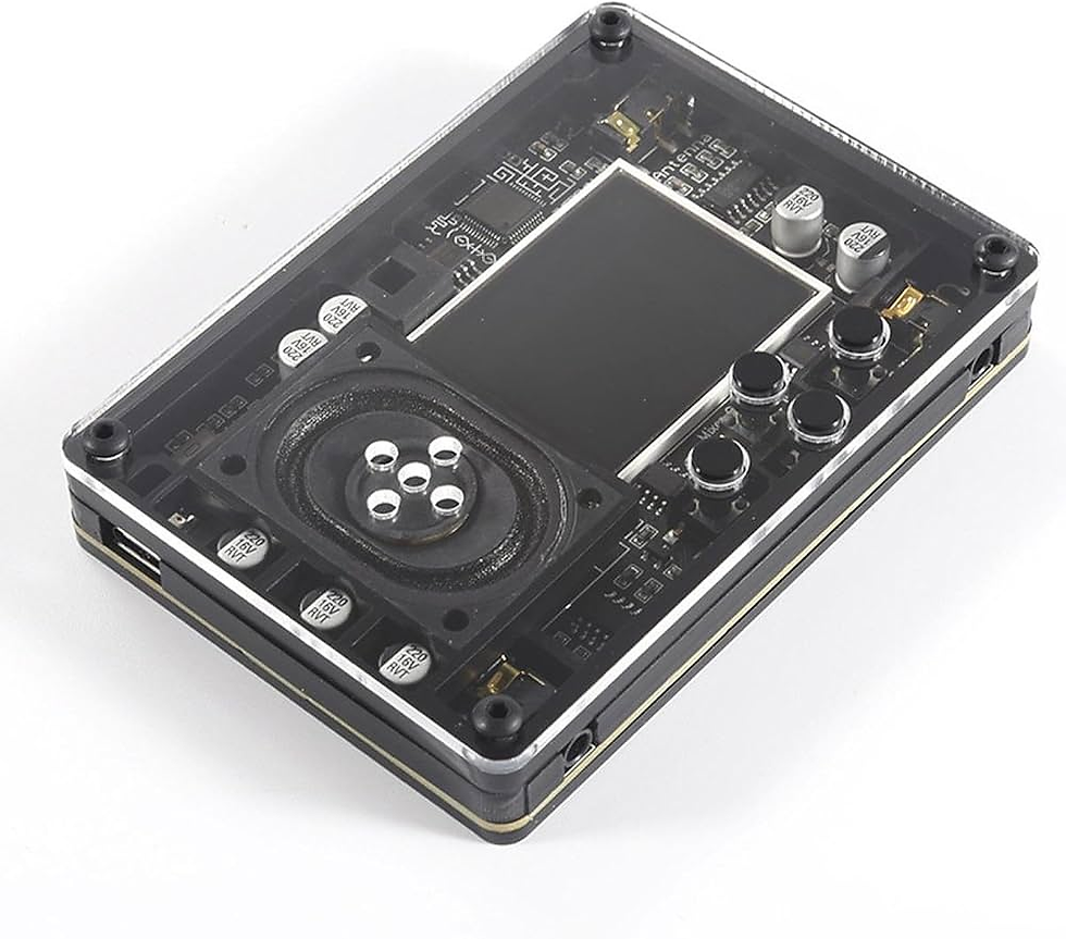 Transparent electronic device with black components, including a screen and buttons, on a white surface. Circuitry is visible inside.