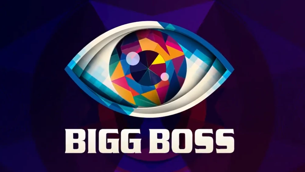 Bigg Boss logo with a colorful eye icon above bold white text on a dark purple background