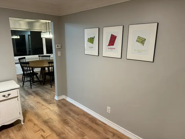 Wide plank vinyl flooring installed in a Hamilton home with natural lighting and clean white trim.