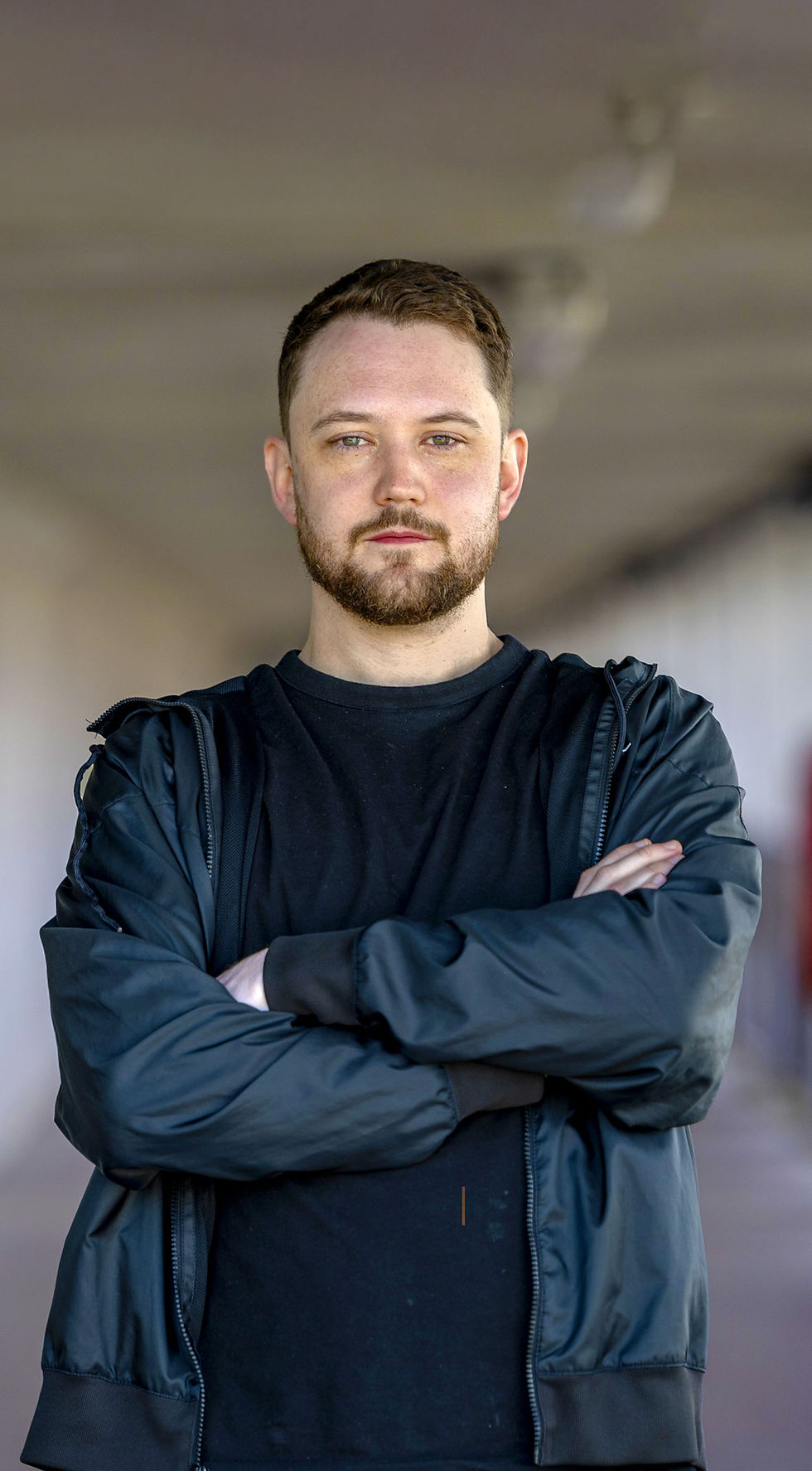 Stunning blond model showing off his sixpack