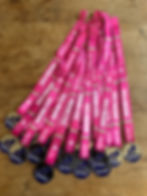 Photo of this year's medals; text on each ribbon says '2025 Finisher, Bike Oxford'