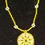 Thumbnail: Yellow Daisy necklace, Wind clan symbol dangle medallion 