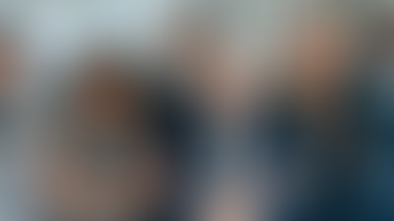 A diverse group of six professional leaders standing together in a modern office environment, all with arms crossed and confident, welcoming smiles. In the context of organizational leadership and conflict resolution, images like this remind us that effective teams are built on the foundation of diverse perspectives and inclusive leadership.