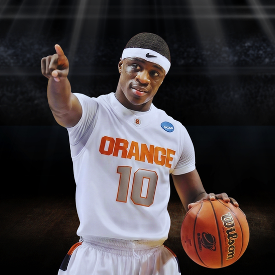 Basketball player in Syracuse Orange jersey holding a ball