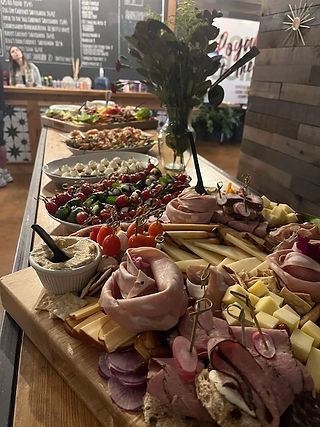 Charcuterie board and appetizers setup