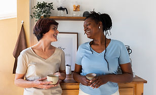 front-view-lesbian-couple-with-coffee-cups.jpg