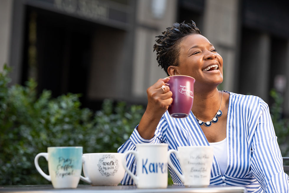 woman sitting at table surrounded by coffe cups looking into sky