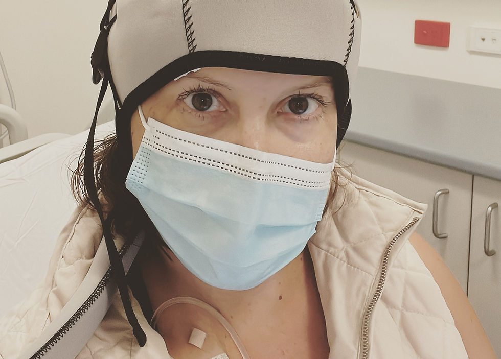 Woman cold capping during Chemo