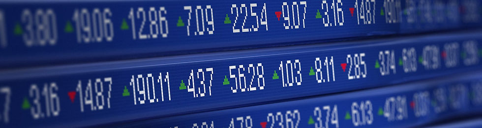 Close-up of a blue digital stock market ticker display.