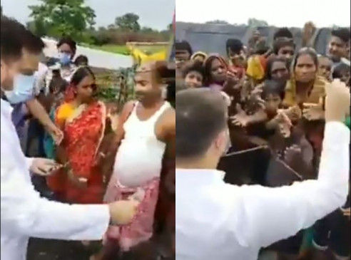 Fake News: Tejashwi Yadav distributed money to people in Bihar election campaign