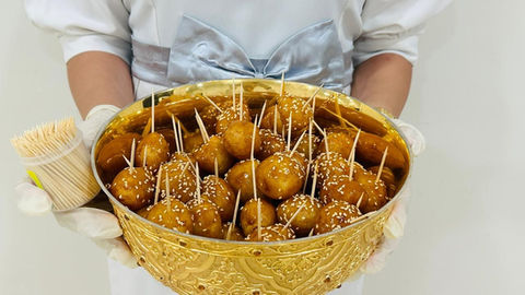 Luqaimat pass around service