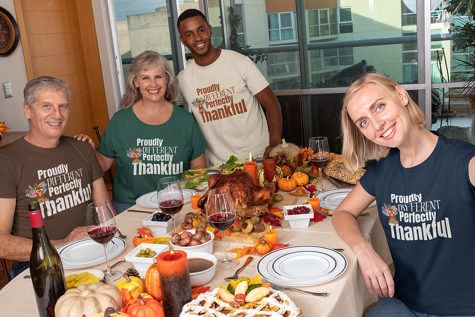 Thumbnail: Family wearing "Proudly Different, Perfectly Thankful" T-shirts, sitting around Thanksgiving dinner table.