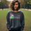 Thumbnail: Dark Heather Grey Easter EggOrdinary Sweatshirt with eggs and bunny ears that represent extra in extraordinary