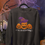 Thumbnail: Gray sweatshirt with three playful jack-o-lanterns, each with its own unique expression