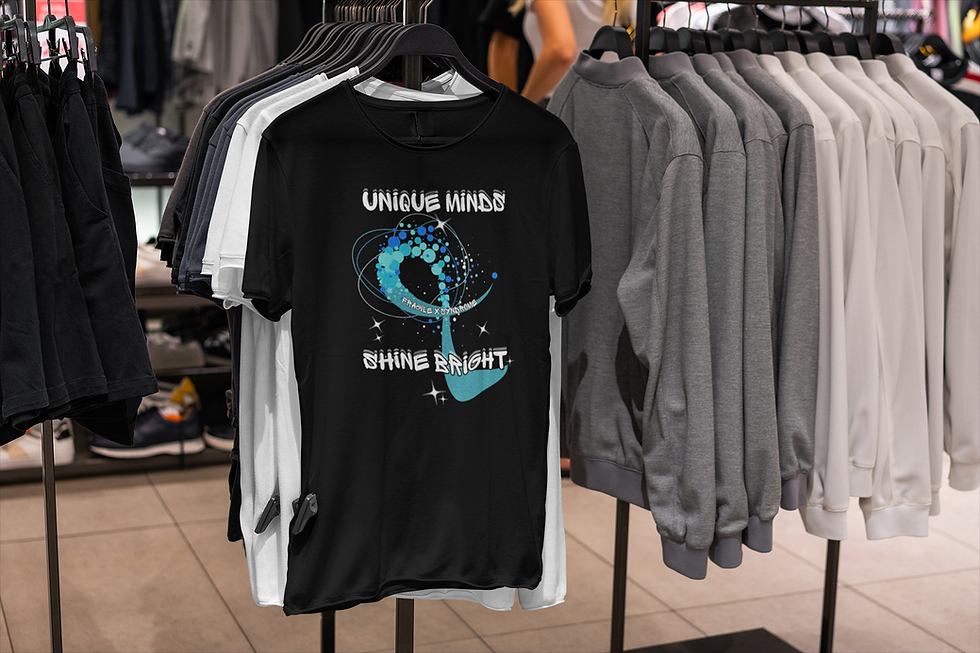 Black t-shirt with text Unique Minds Shine Bright" and cosmic design