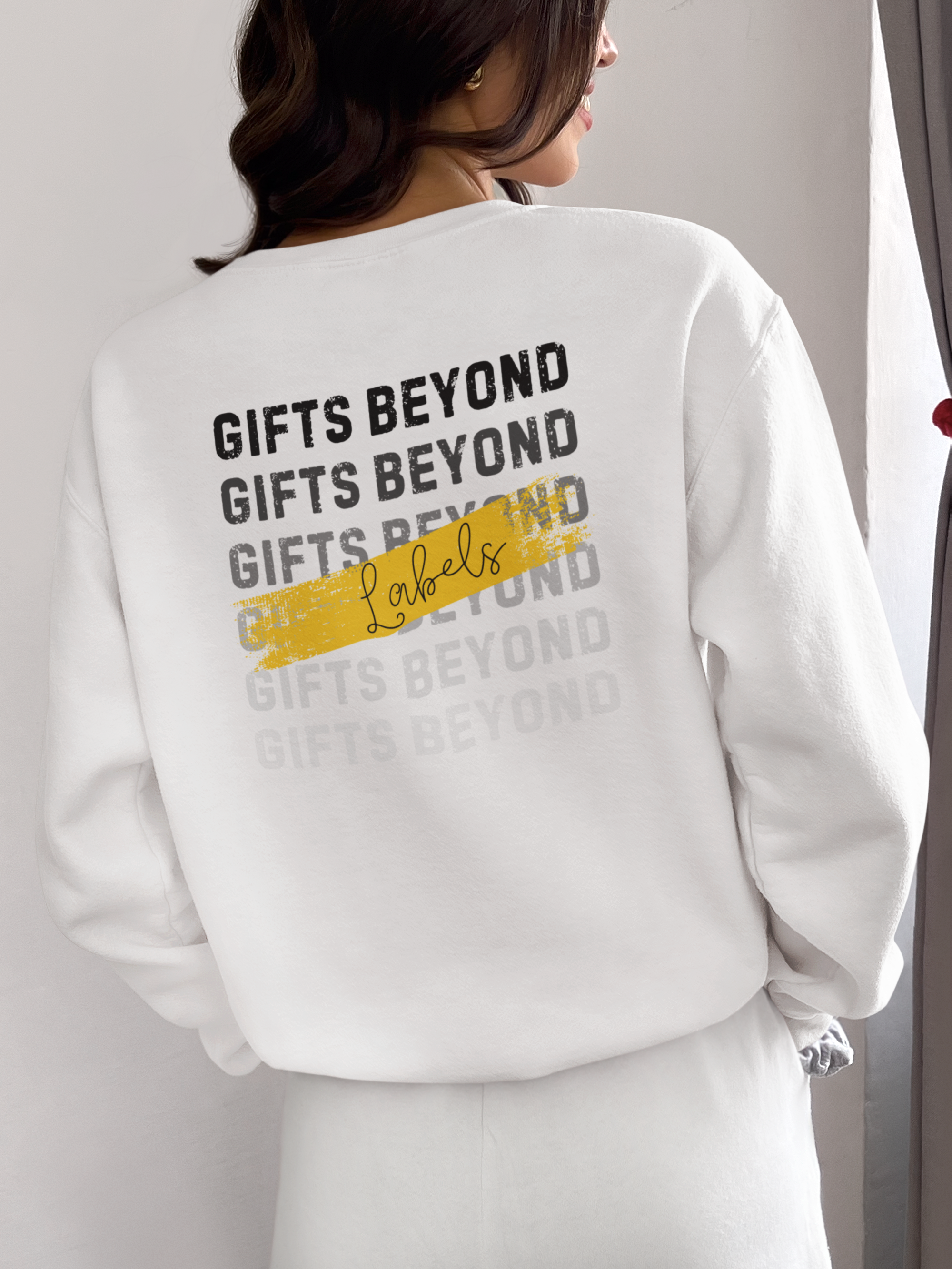 White sweatshirt with text Gifts Beyond Labels Back View