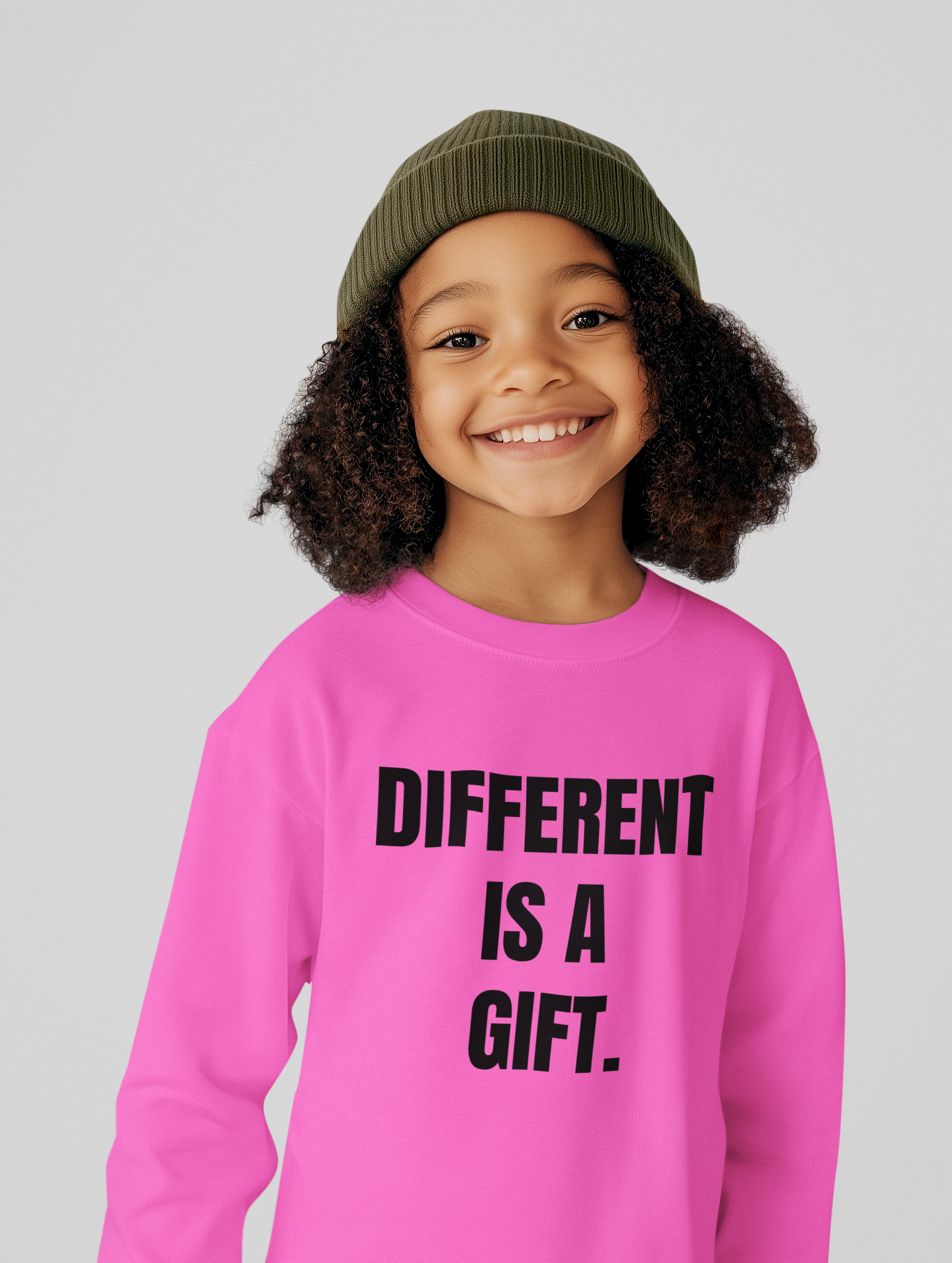 Bold letters Different Is A Gift centered on sweatshirt
