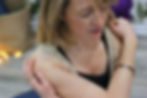 A women compassionately supporting herself through self soothing