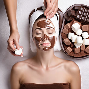 chocolate marshmellow facial on white woman with spa background.jpg