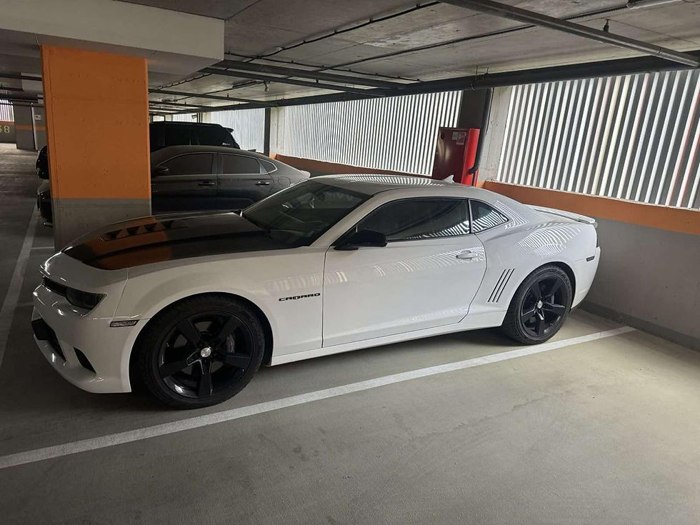 Прев'ю: Спорт кар білого кольоору Chevrolet Camaro SS, 2015 року