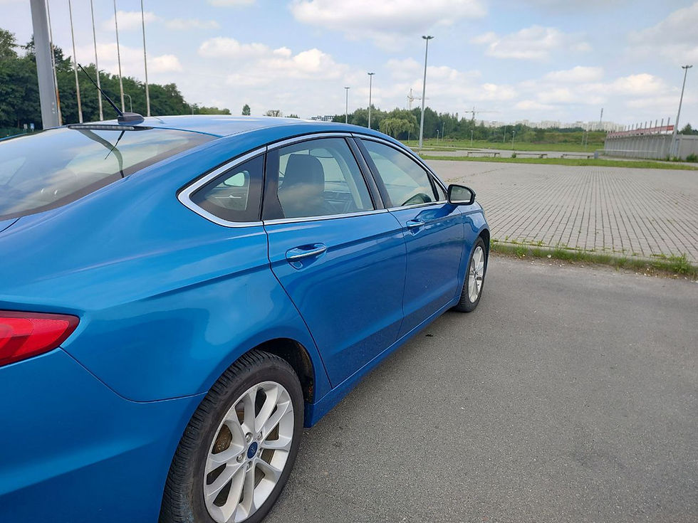 Прев'ю: Блакитний автомобіль 2019 Ford Fusion Plug-in Hybrid Titanium на