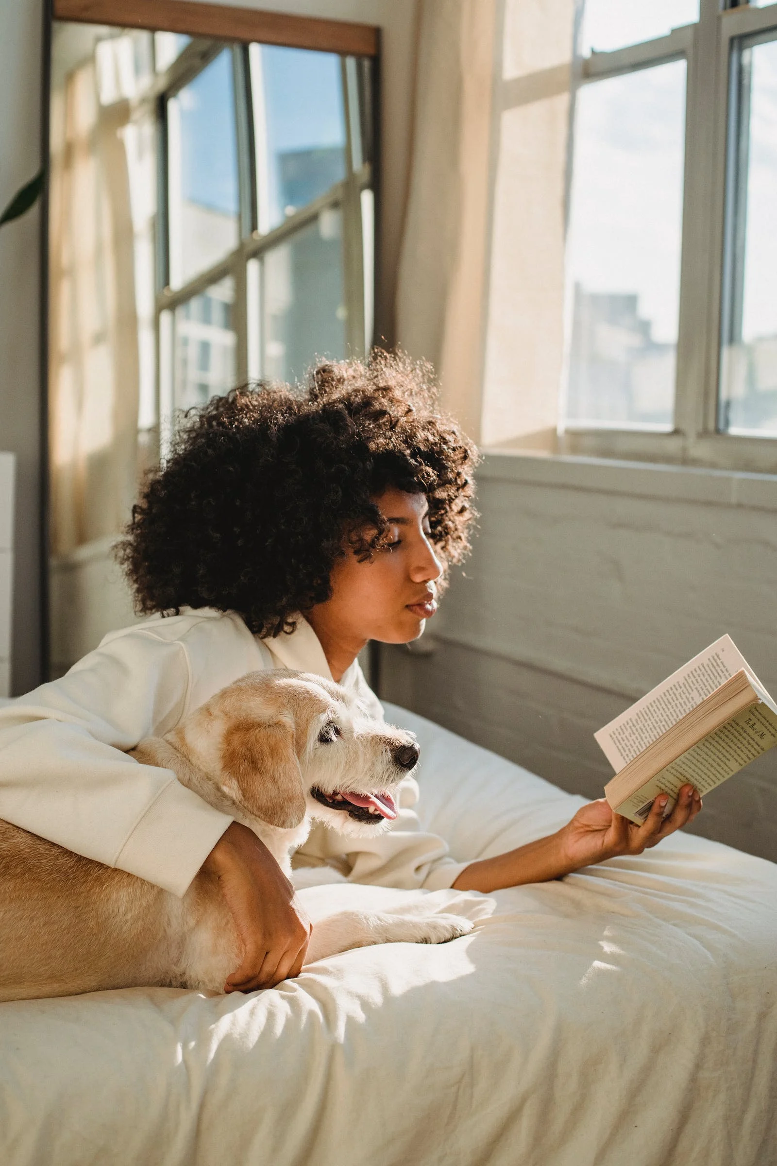 Girl reading with her dog | Self-love matters | The importance of self-love | How to cultivate self-love | Therapy for self-love and improvement | Begin therapy today | Start therapy in New York | Therapy in New York City | 10001 | 10002 | 10003 | 10028