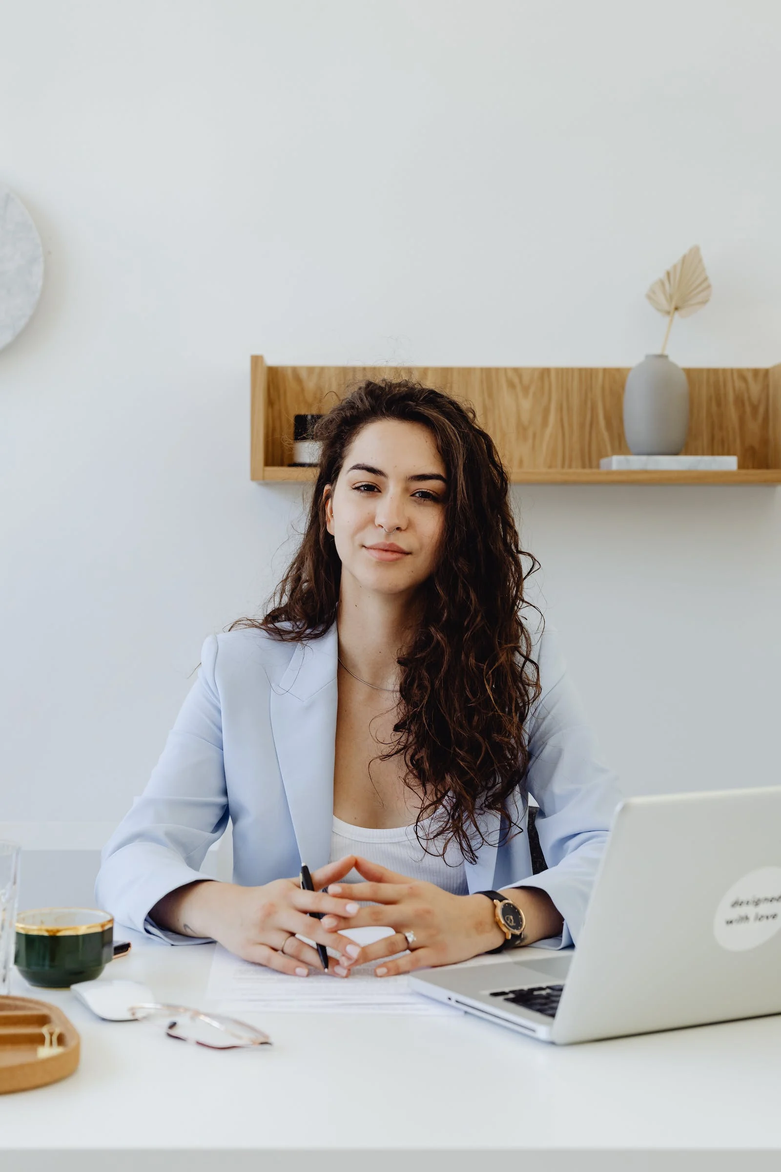 Professional smiling at her desk | Mindfulness therapy for New Yorkers | Therapy in New York | Start therapy now | Begin Therapy Today | Therapy for Anxiety in New York | Therapy for Depression in New York | 10002 | 10003 | 10004 | 10005 | 10016