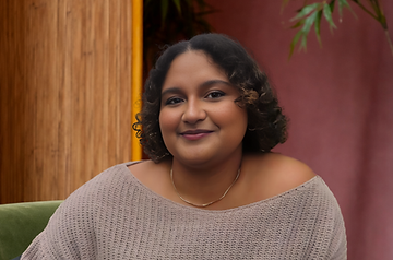Headshot of Risa, therapist serving NY, NJ, and MA specializing in anxiety, burnout, and identity work for BIPOC and LGBTQ+ clients.