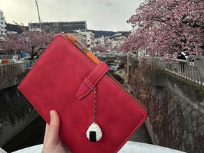 A japanese diary with sakura in background
