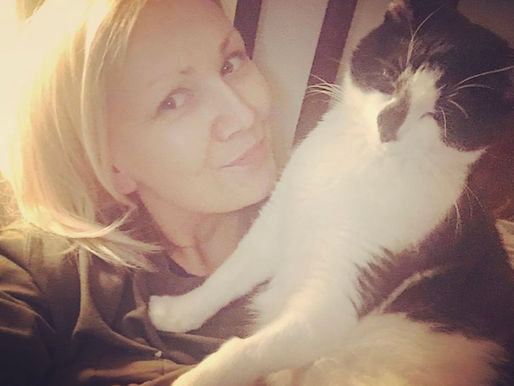 Lisa caring for a cat