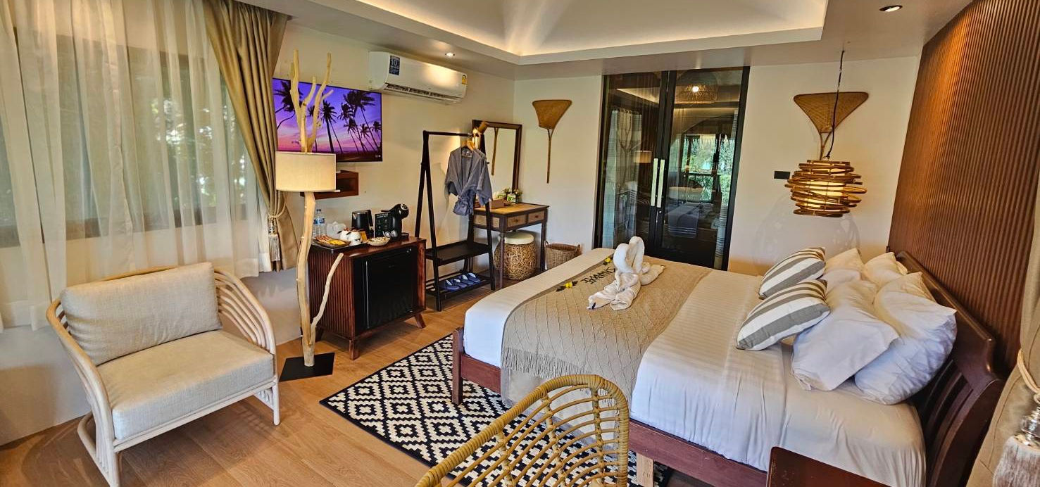 Luxury Sunset View Room with twin beds and modern amenities at Khao Sok Boutique Camps
