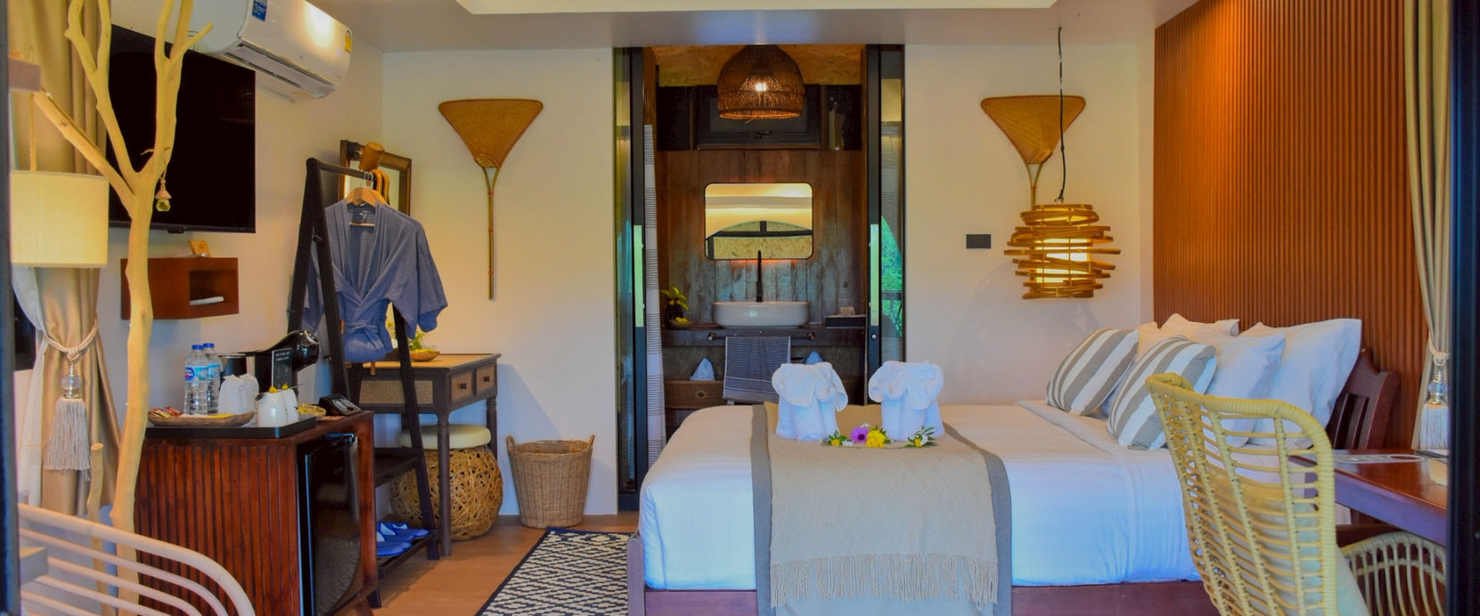 Modern Sunset View Room with king-size bed and elegant interior design