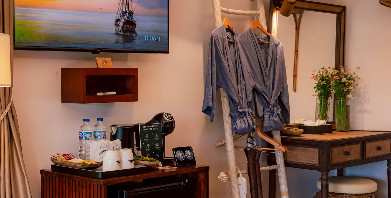 Modern Sunset View Room featuring air conditioning television and wardrobe
