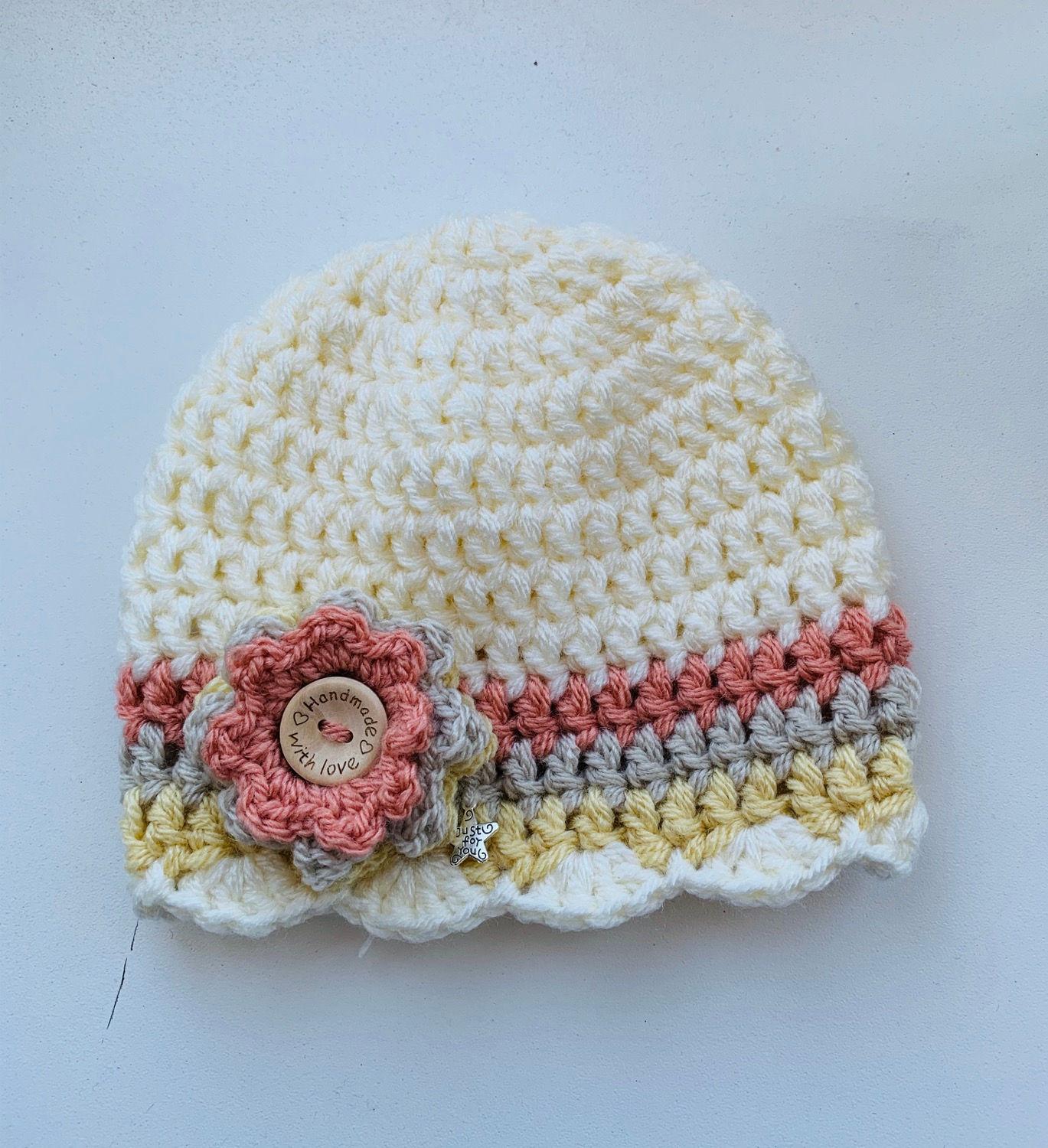 Peach, straw, stone and cream beanie