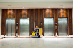 EcoClean Victoria cleaners trolley in front of elevator