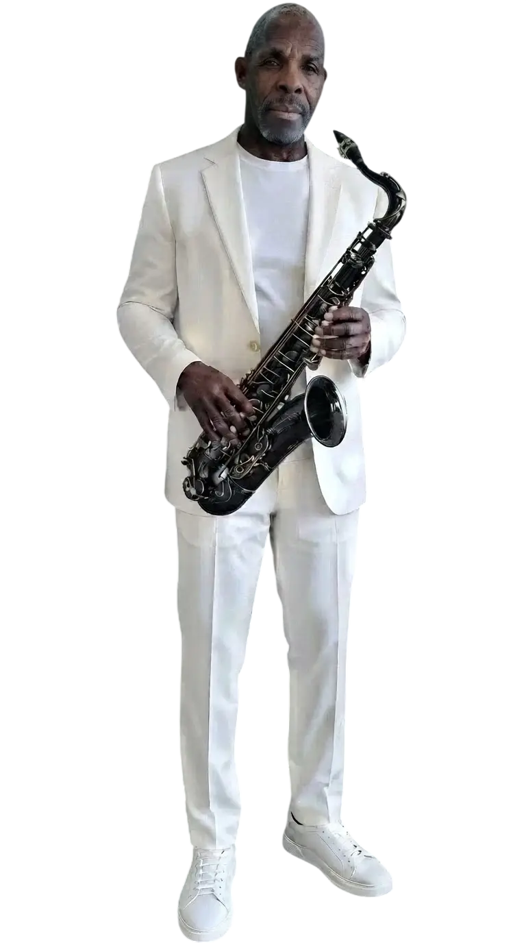 Studio photography of a man in a crisp white suit playing a black saxophone. The sharp contrast against the solid black background creates a sleek, professional jazz aesthetic.