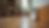Eye-level view of radon testing device placed on a wooden floor