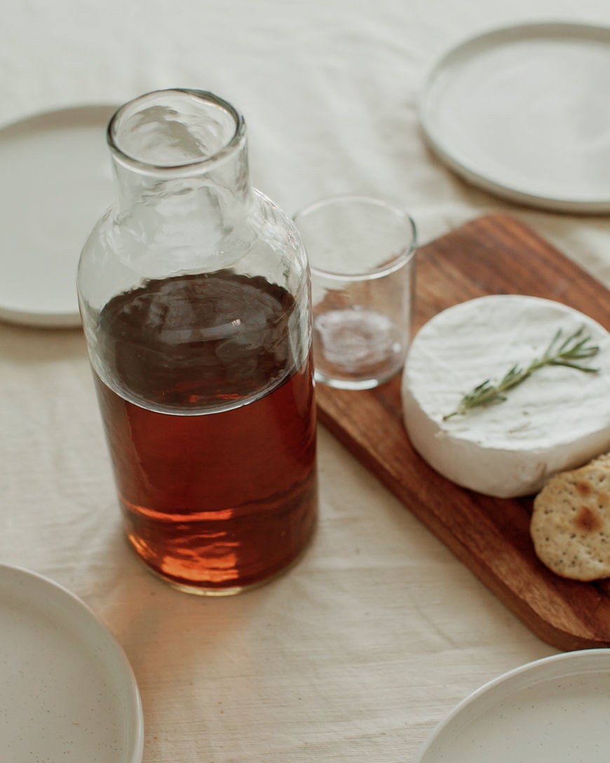 Handblown Hammered Glass Carafe clear on table