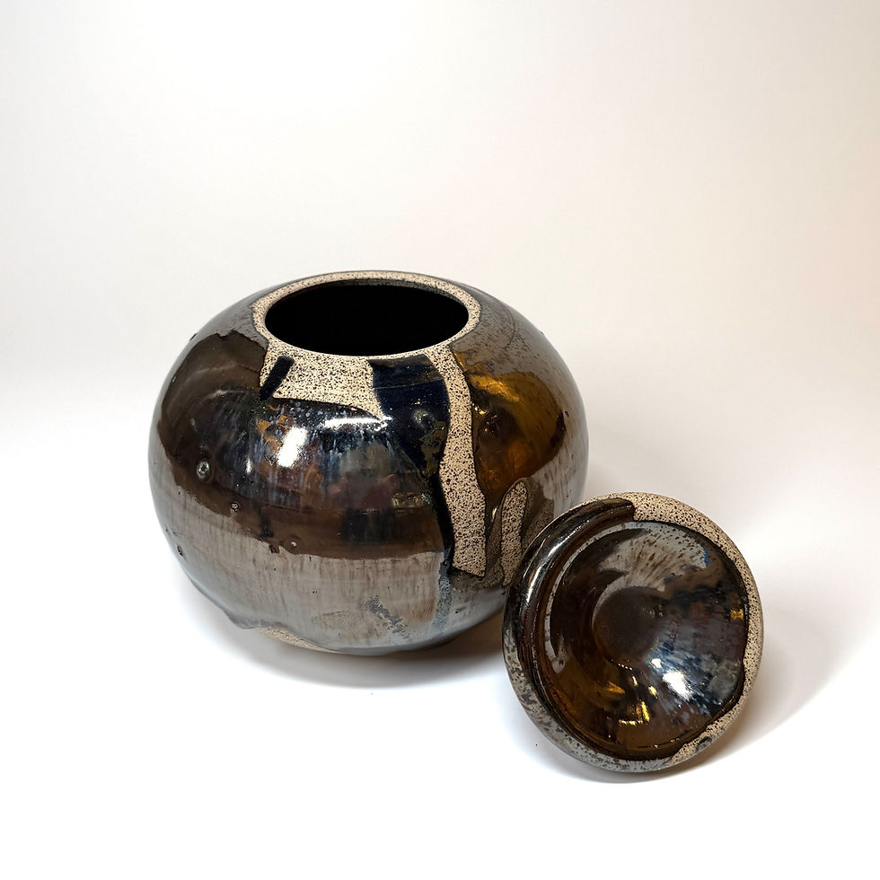 Finch Ceramics Stoneware Lidded Vessel with Metallic Glaze open with lid on the side