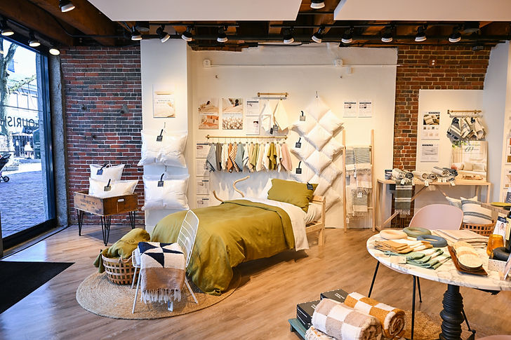 Flourish and Foundry Shop at Faneuil Hall Marketplace showing bedding collection.
