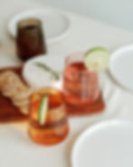 Handblown Hammered Recycled Glass Tumblers on table