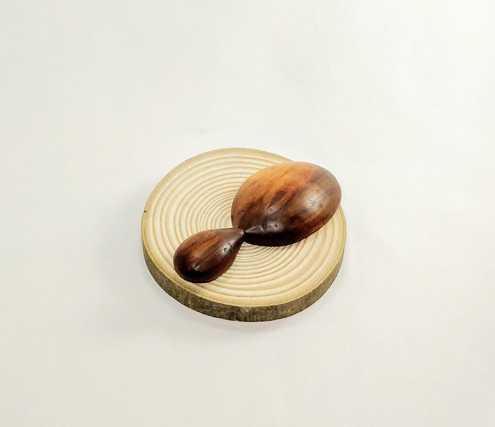 Thumbnail: Back view of small oval scoop with rounded handle. Dark burnished wood grain.