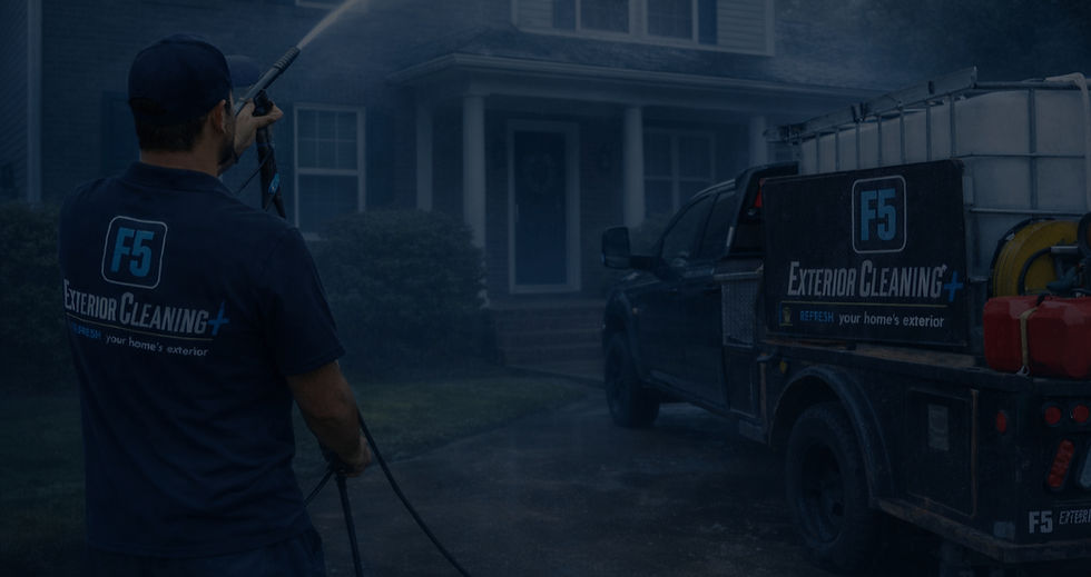 Pressure washing a colonial-style home_edited.jpg