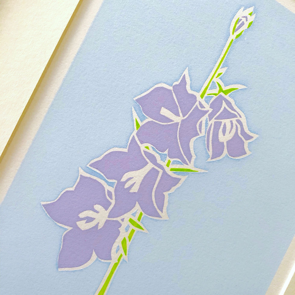 Thumbnail: close up view of a handmade silkscreen print featuring a purple campanula flower on a blue background