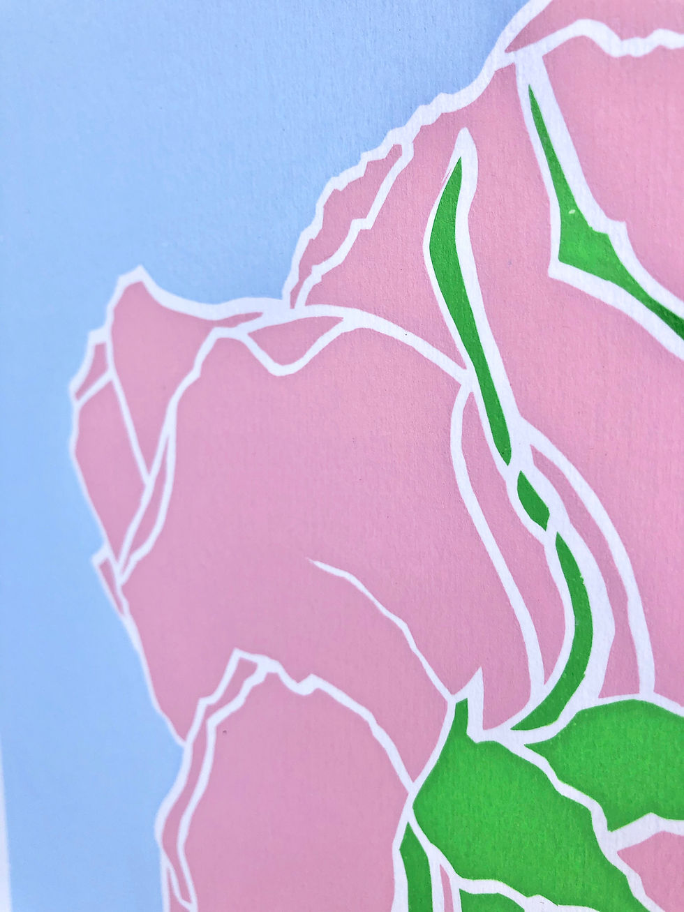 Thumbnail: close up view of a roses art print of pink rose petals and green leaves on a blue background