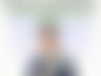 Ben Tan smiling, holding "Value Investing" book against a white background with text: My stock analysis for the London Stock Exchange Group.