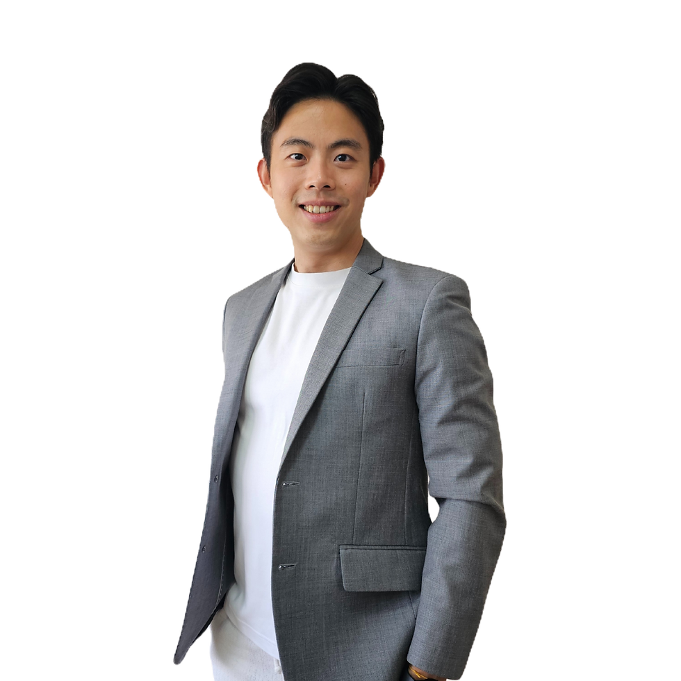 Ben Tan in a gray suit and white shirt against a plain background, conveying a professional and confident mood.