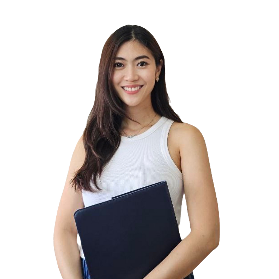 Vann Lim in a white tank top holds a dark folder. She's standing against a plain background, exuding a confident and positive mood.